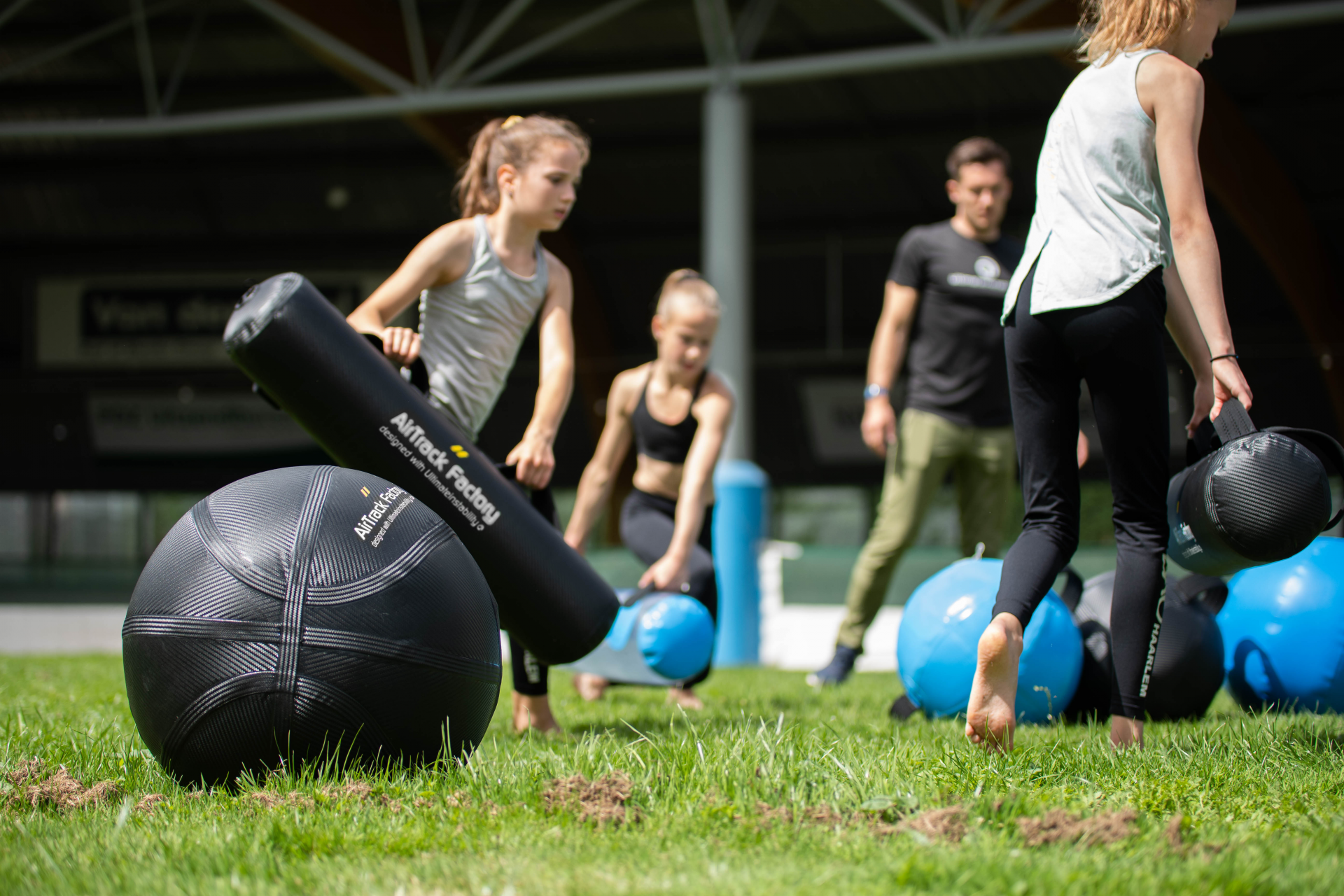 Gymnasts using aquabags for training